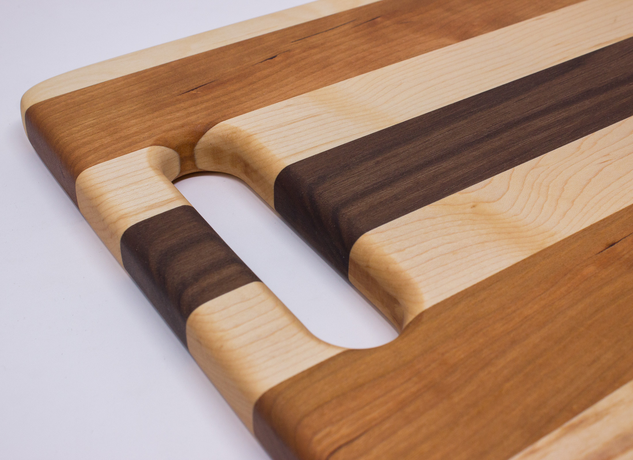 Maple, Cherry and Walnut with Handle Cutting Board