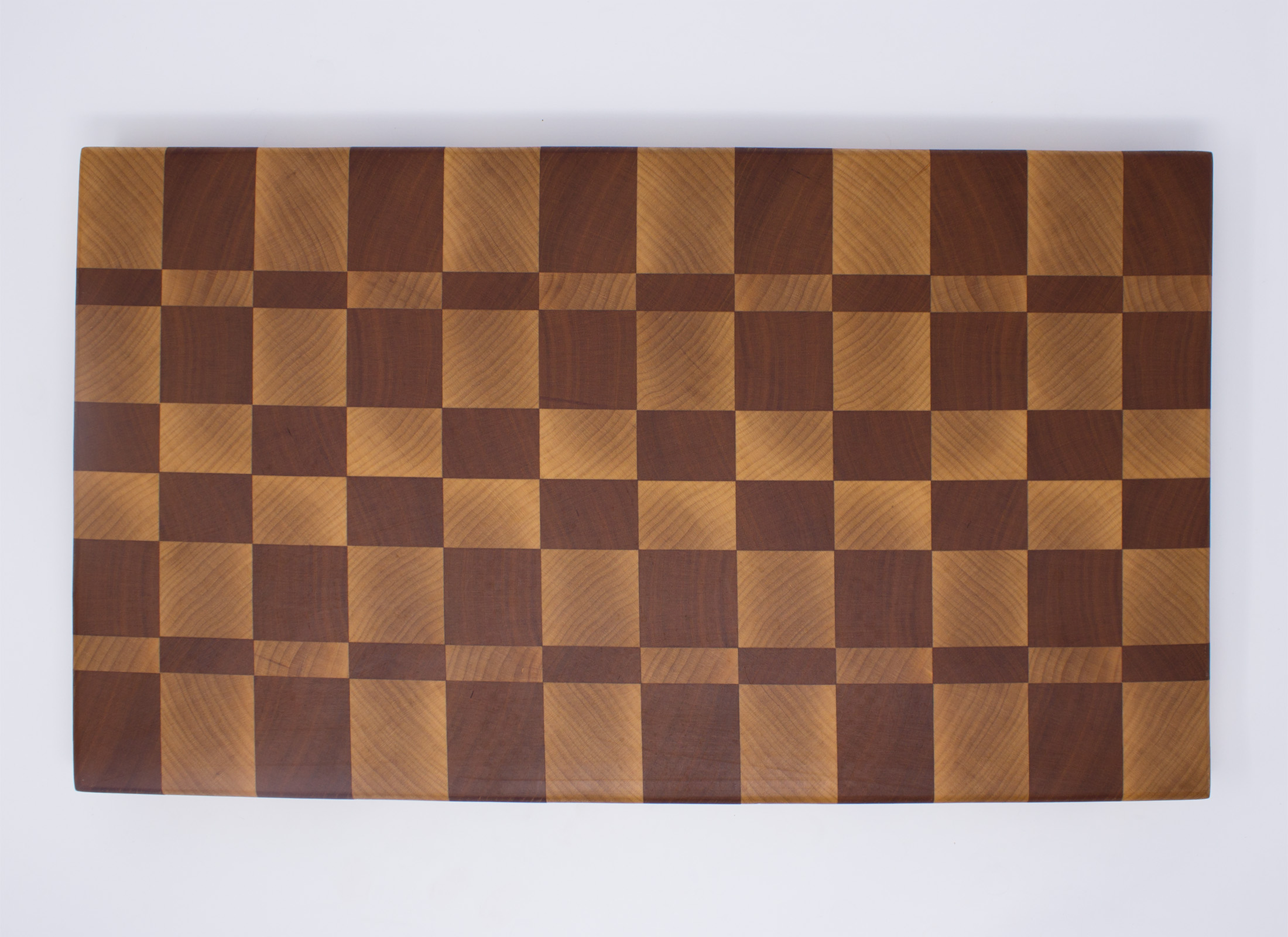 https://www.rockfordwoodcrafts.com/wp-content/uploads/Maple-and-Cherry-Checkerboard-End-Grain-Cutting-Board-Top.jpg