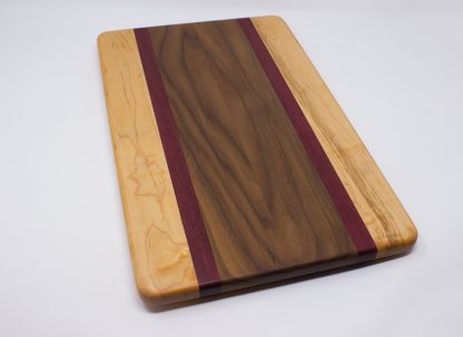Walnut with Purple Stripes and Maple Edges Cutting Board - Image 3